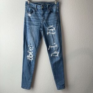 American Eagle size 4 Super Stretch X Skinny Distressed Medium Wash Pants